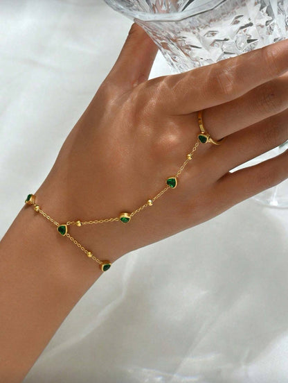 إسورة يد من الستانلس ستيل الذهبي مزينة بقلوب خضراء من الزركون