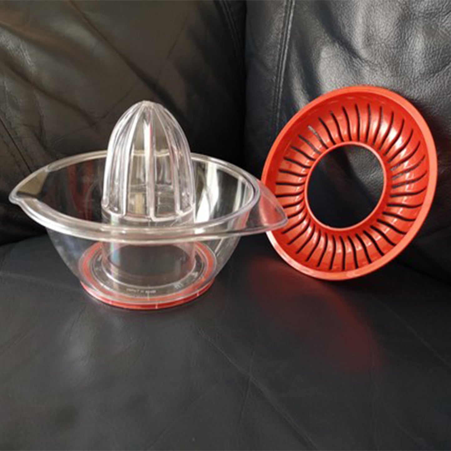 عصّارة حمضيات بلاستيكية شفافة