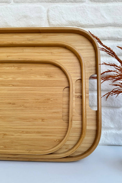 طقم صواني تقديم خشب بامبو بيضاوي – 3 قطع بأحجام مختلفة