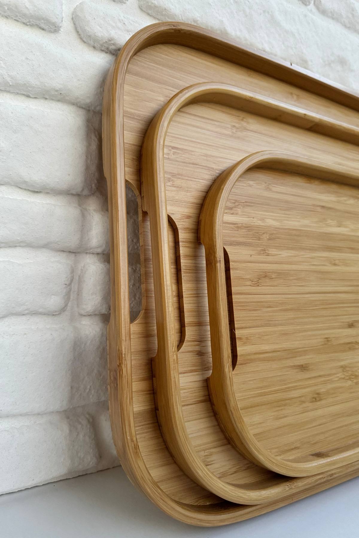 طقم صواني تقديم خشب بامبو بيضاوي – 3 قطع بأحجام مختلفة