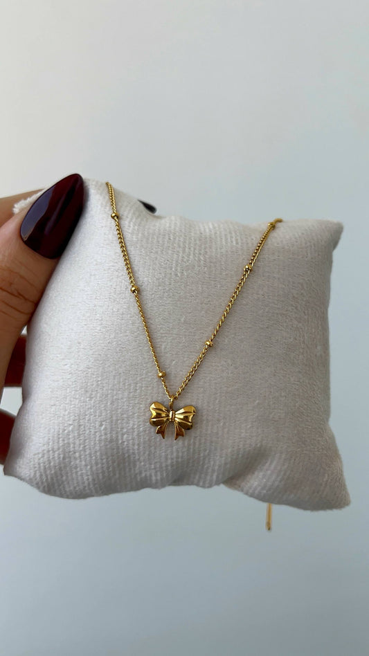 عقد فيونكة استانلس باللون الذهبي