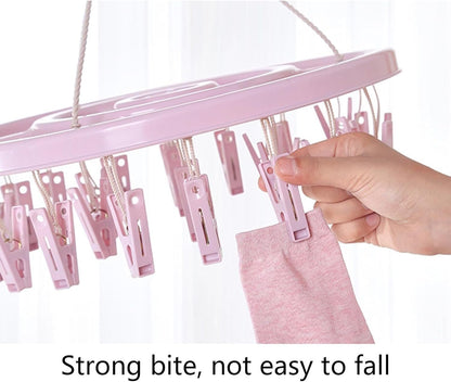 منشر غسيل بلاستيكي ودائري مع شماعة  مشابك