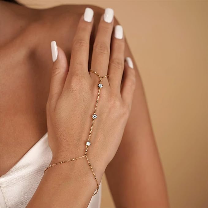 إسورة يد بخاتم متصلة بسلسلة استانلس ذهبي مزينة بكرستال – تصميم بوهيمي أنيق