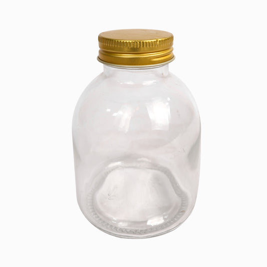 برطمان زجاجي دائري قديم الطراز مع غطاء معدني ذهبي