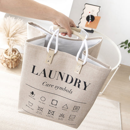 سلة غسيل قماشية مع رموز العناية ومقابض مزدوجة
