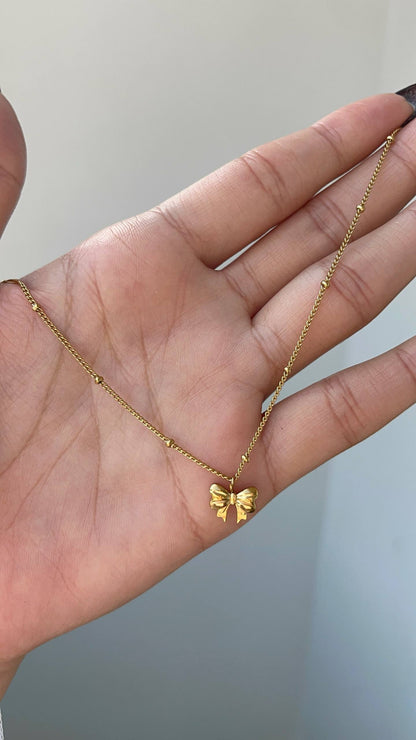 عقد فيونكة استانلس باللون الذهبي