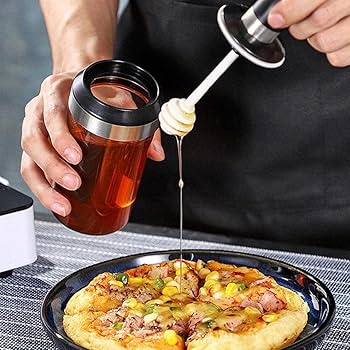 برطمان عسل زجاجي شفاف مع ملعقة للتقديم