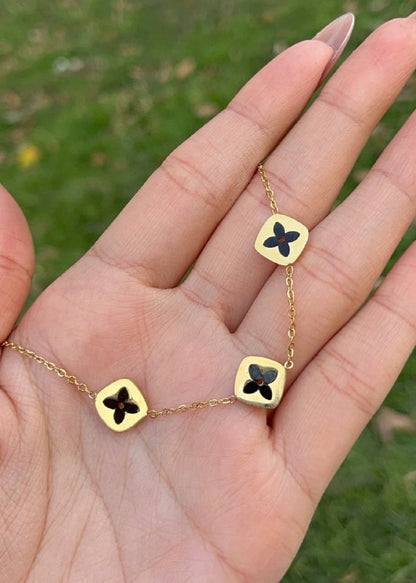 إسورة سلسلة مطلية بالذهب من الستانلس ستيل بتصميم البرسيم الرباعي