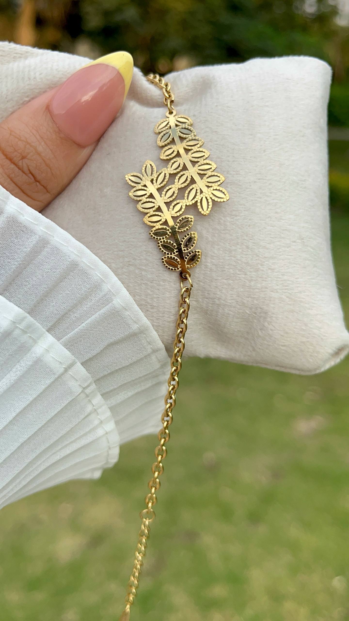 إسوارة غصن الزيتون ستانلس ستيل بيور ذهبي