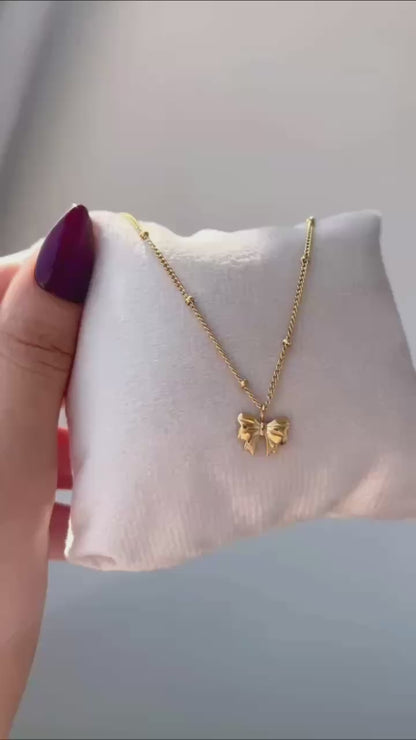 عقد فيونكة استانلس باللون الذهبي